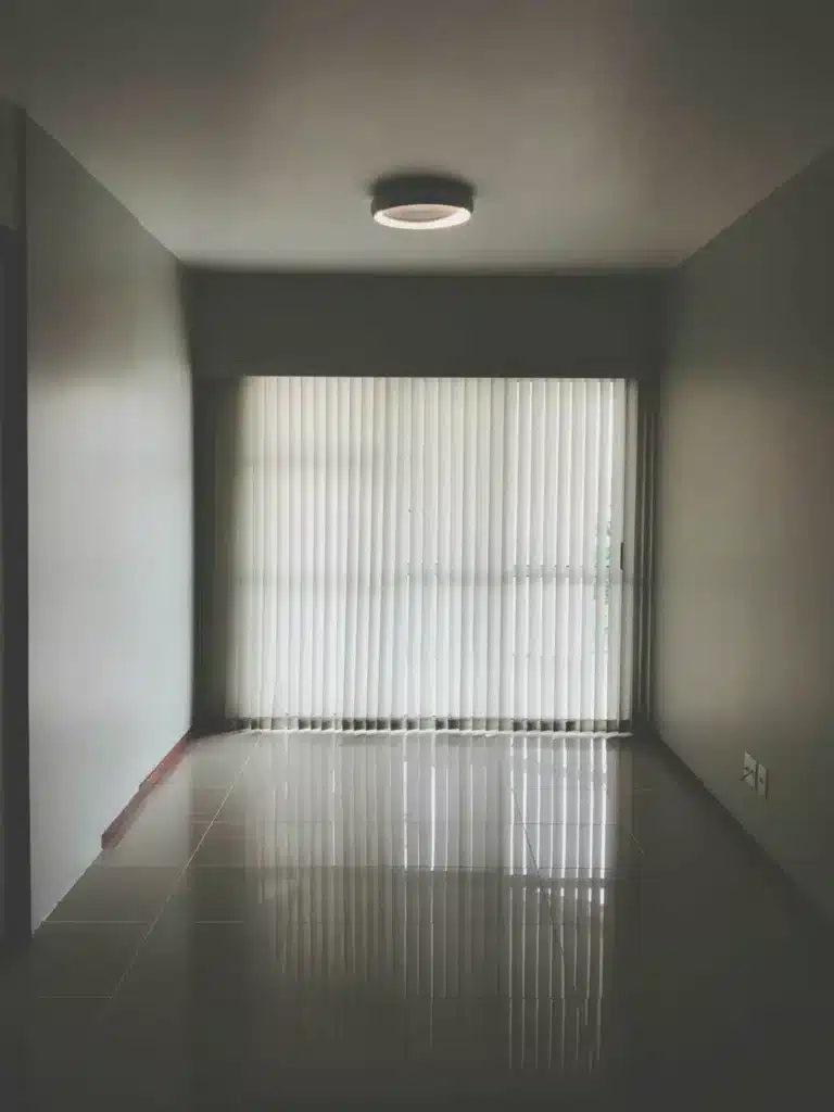 Plantation shutters offering light control in a stylish living room.