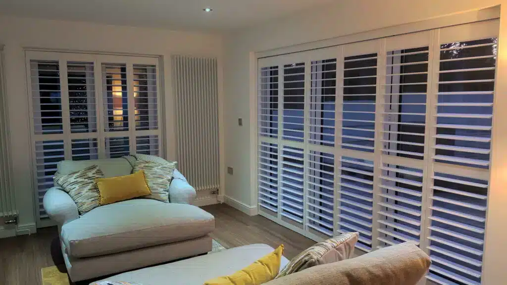 Shutter installation in Romford by London Essex Shutters and Blinds featuring bespoke window coverings in a contemporary living room