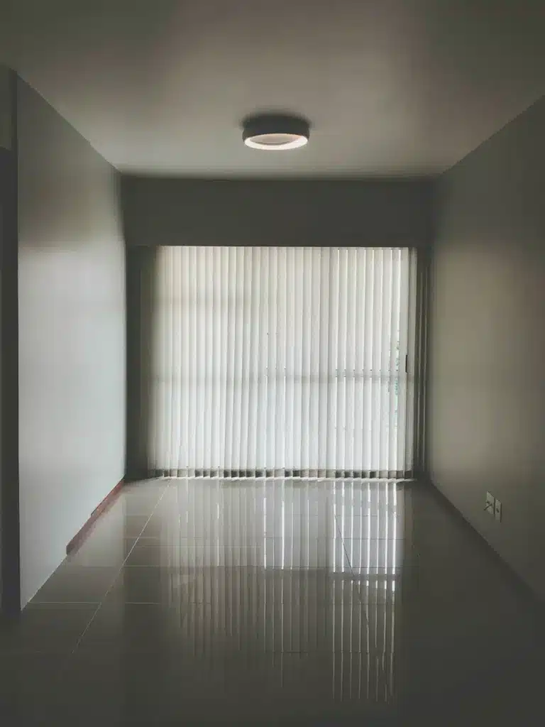 Shutter Installation Cost In Romford - Minimalist room with vertical blinds by London Essex Shutters and Blinds