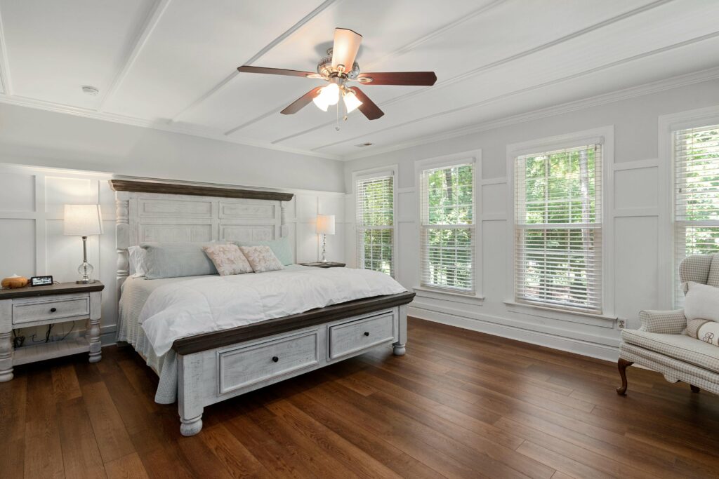Rich espresso plantation shutters create bold contrasts in Essex homes.