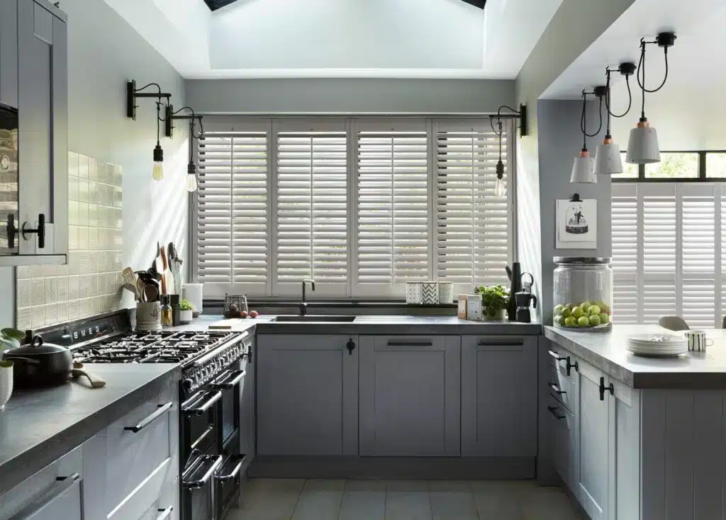 Modern kitchen featuring bespoke shutter installation in Goodmayes by London Essex Shutters and Blinds