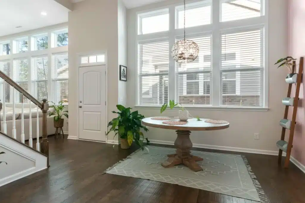 Tier-on-tier timber shutters installation in a modern interior