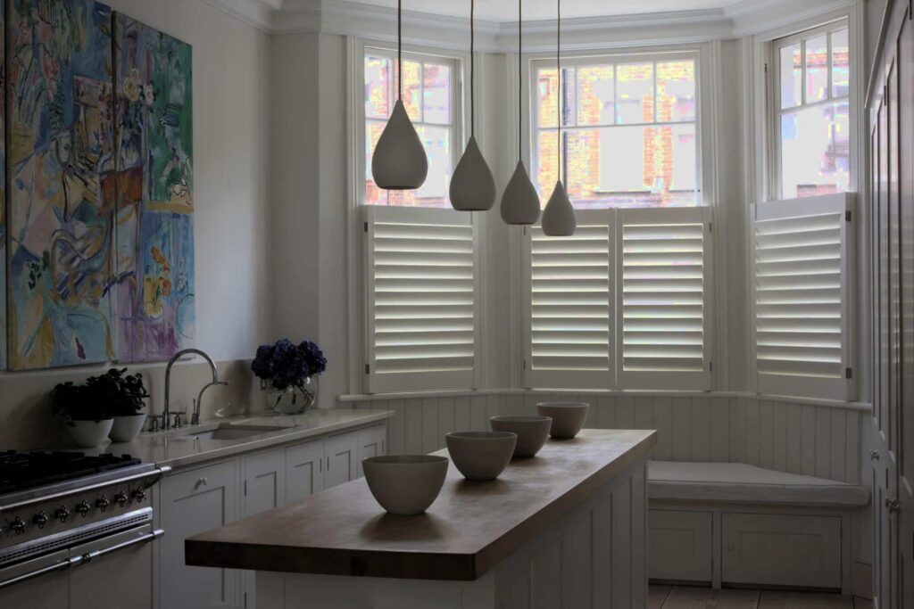 Creative plantation shutters designed with industrial metal finishes.