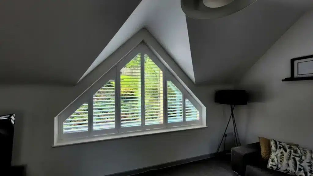 Bright white plantation shutters enhancing London home interiors.