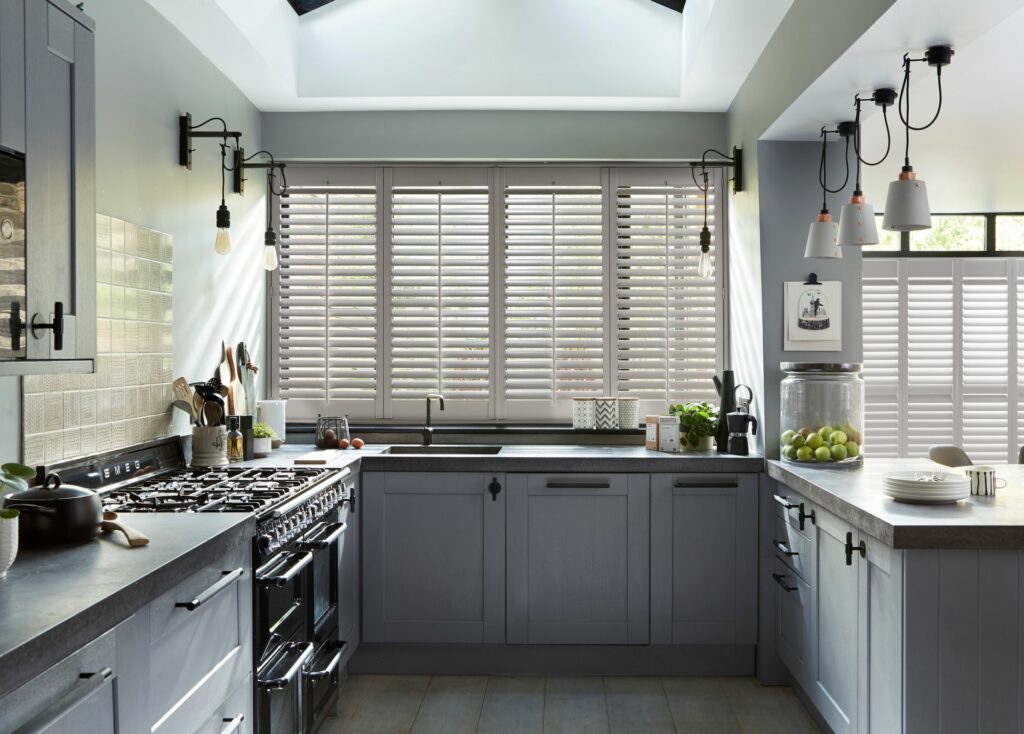Beautiful custom-shaped shutters installed for unique window design in North London.