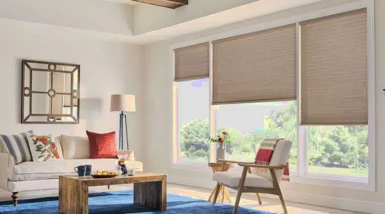 Fitted Window Shutters In Widford enhancing a cozy living room with bespoke window coverings