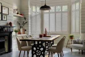 Elegant fitted window shutters in Aveley dining room from London Essex Shutters and Blinds