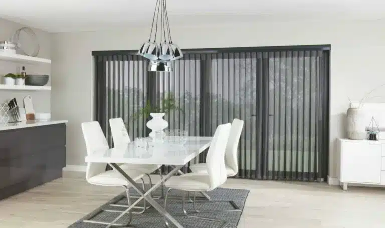 Shutter Installation Cost In Havering - Modern dining room featuring vertical window shutters and contemporary white furniture