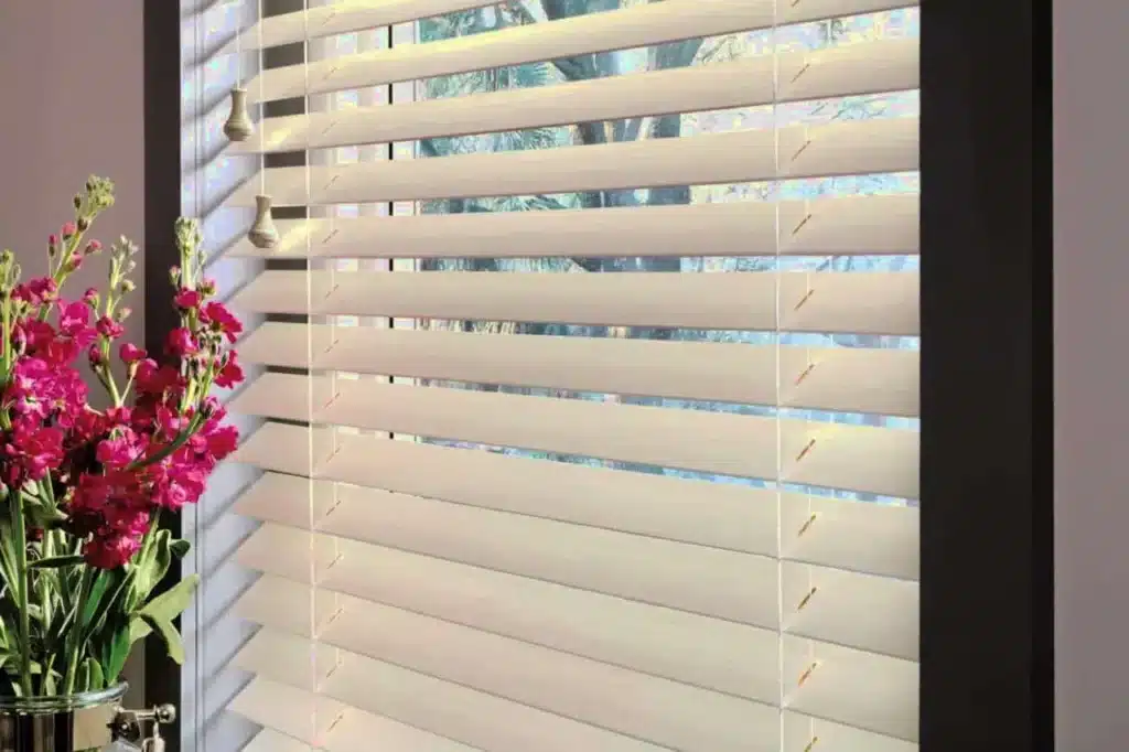 Professional shutter installation in Woolwich featuring bespoke white window coverings