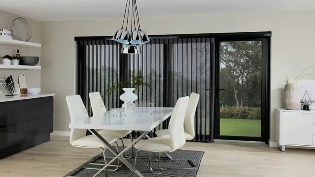 Elegant tier-on-tier shutters installation in a living room for light control and privacy.