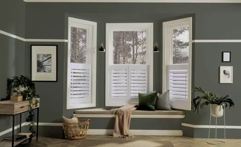 Best light control window shutters in London installed in a stylish living room.